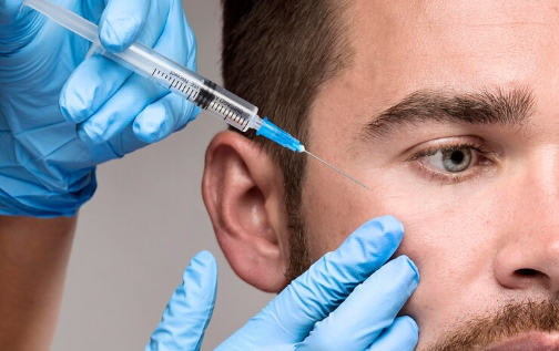 Man receiving facial injection treatment, showcasing aesthetic procedure related to rejuvenation and skin enhancement at Prime Vitality Care.
